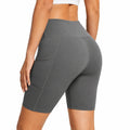 Damen Radlerhose L aus elastischem Synthetikmaterial in Dunkelgrau mit hoher Taille und Seitentasche